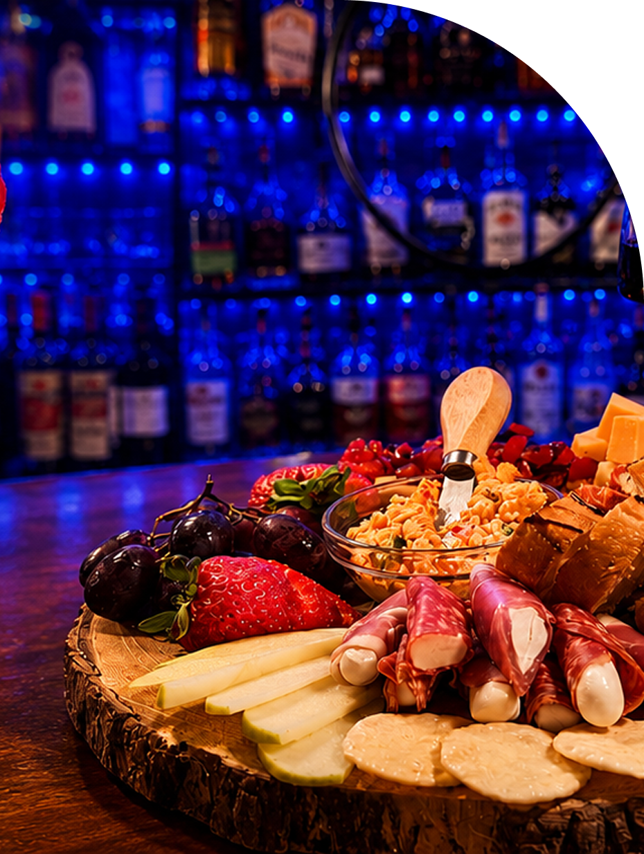 Charcuterie board with fruits and cheeses.